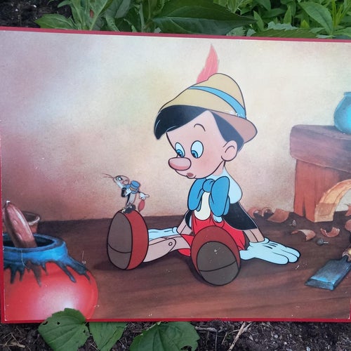 Pinocchio med Benjamin Syrsa på foten osignerad Vacker och charmig