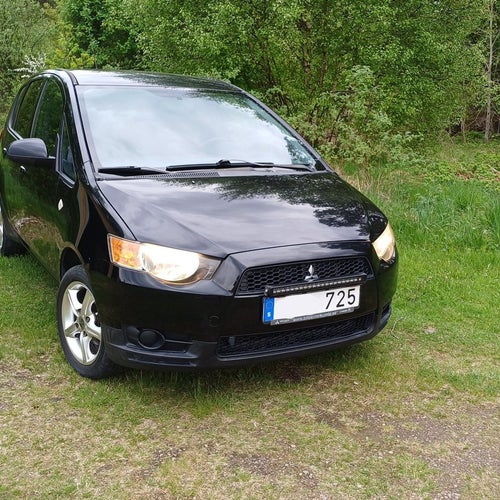 Mitsubishi Colt Nybesiktigad