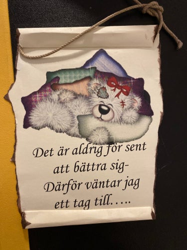 Väggdekoration med text och nallebjörn