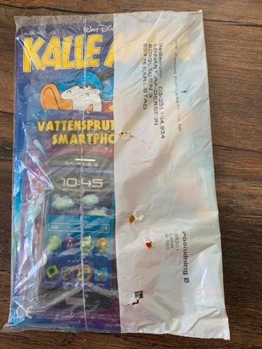 Kalle Anka & C:o 26/2014 inplastad med Vattensprutande smartphone