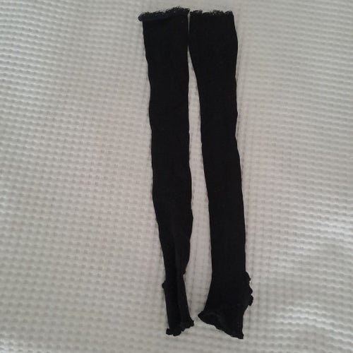 Svart benvärmare