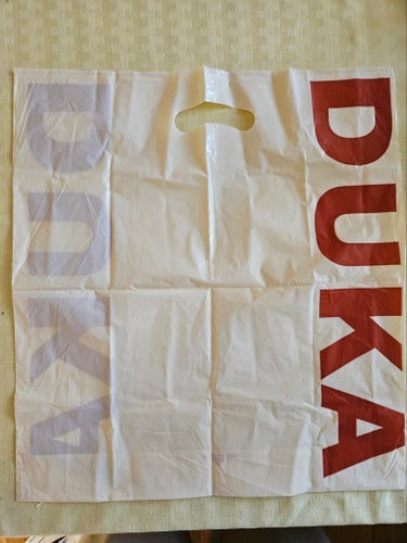Nostalgisk Duka plastpåse vit