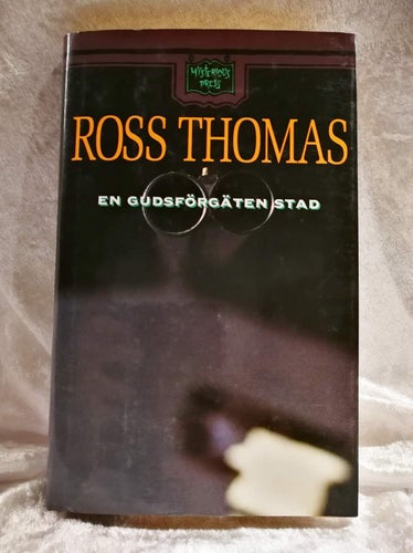 Ross Thomas - En gudsförgäten stad (Inbunden 1991 Durango Kalifornien Skattefusk