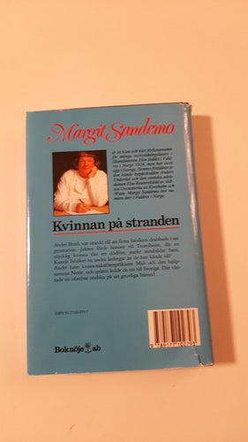 SAGAN OM ISFOLKET 34 KVINNAN PÅ STRANDEN INB M.OMSLAG MARGIT SANDEMO FINT SKICK