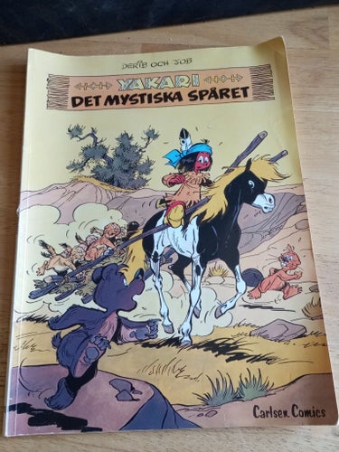 Seriealbumet "Yakari: Det mystiska spåret" av Derib och Job, 1:a upplagan 1985