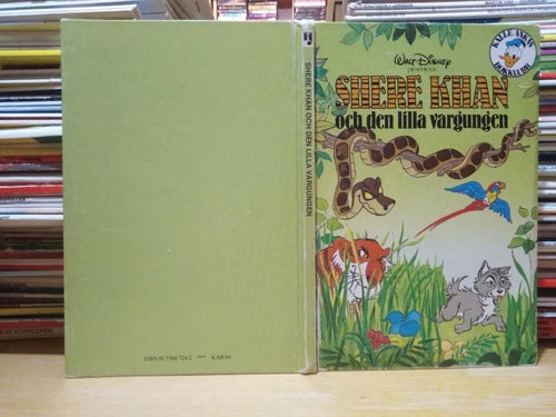 Walt Disney presenterar Shere Khan och Den Lille Vargungen Kalle Ankas bokklubb