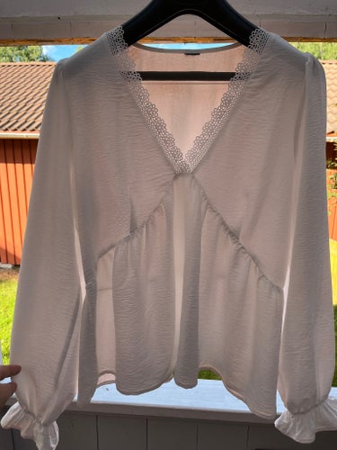 Vit blus