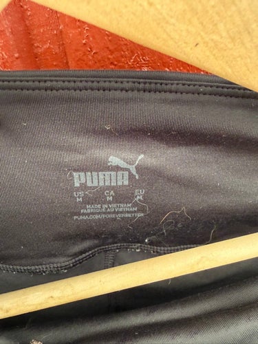 Puma svarta träningstights, storlek M