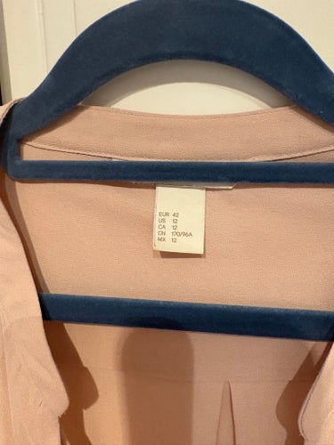 H&M ljusrosa blus, storlek 42