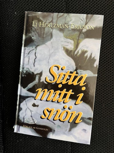 Sitta mitt i snön av Li Hertzman-Ericson