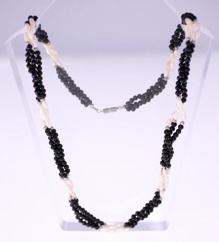 Vintage triple strand white and black plastic bead necklace-metal cylinder clasp