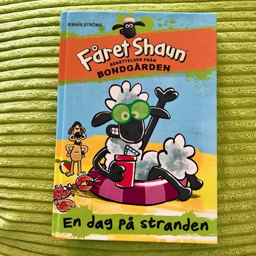 FÅRET SHAUN Berättelser från bondgården EN DAG PÅ STRANDEN 2015