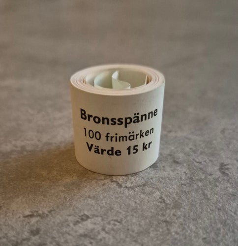 Obruten frimärksrulle Bronsspänne 100 st (Totalt 15 kr) – Postfrisk / Nominal