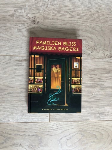 Familjen Bliss Magiska Bageri av Kathryn Littlewood, 2012