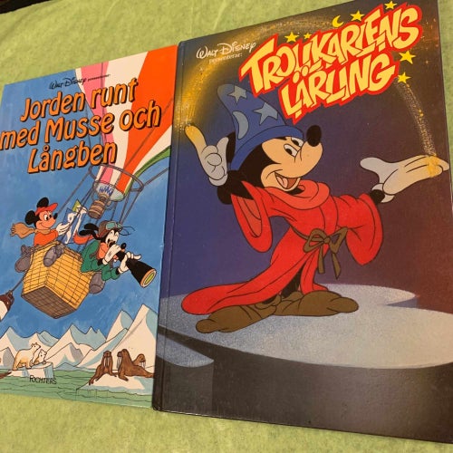 Två Walt Disney böcker: Jorden runt med Musse och Långben & Trollkarlens Lärling
