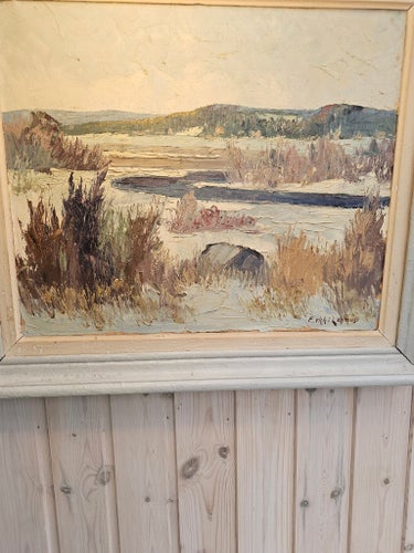 Målad tavla med vinterlandskap