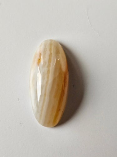 Cabochon av natursten onyx 25 x 11 mm