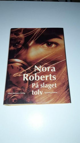 Nora Roberts - På slaget tolv (Inbunden) Spänning
