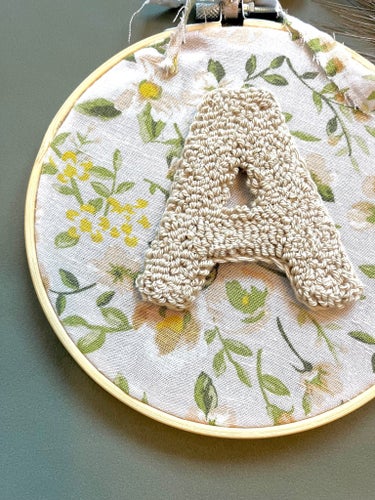 Broderad bokstavstavla