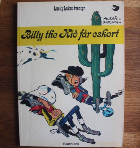 LUCKY LUKE ALBUM NR 11 Billy the Kid får eskort 1975 2:a uppl
