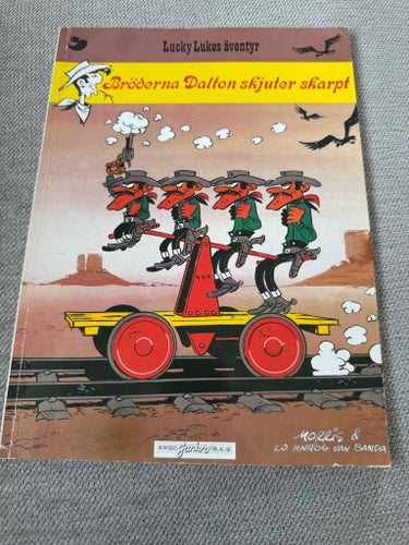 Lucky Lukes Äventyr nr 55: Bröderna Dalton. skjuter skarpt (1987)
