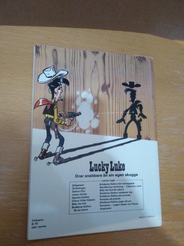 Lucky Lukes äventyr 15 Bröderna Dalton jagar ett arv 1974 första upplagan