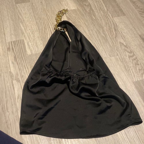 Svart halternecktopp