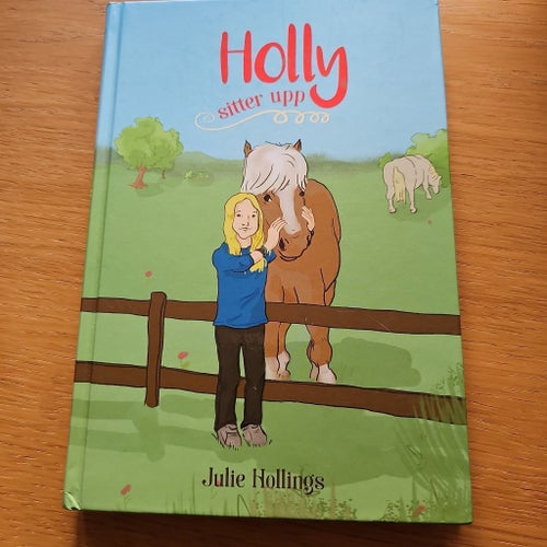Holly sitter upp - Julie Hollings