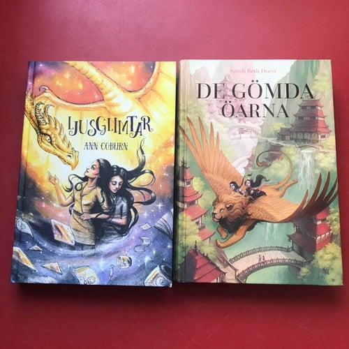 LJUSGLIMTAR Ann Coburn + DE GÖMDA ÖARNA Sarah Beth Durst GIRL-IT