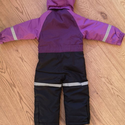 Lila, svart overall, storlek 74/80