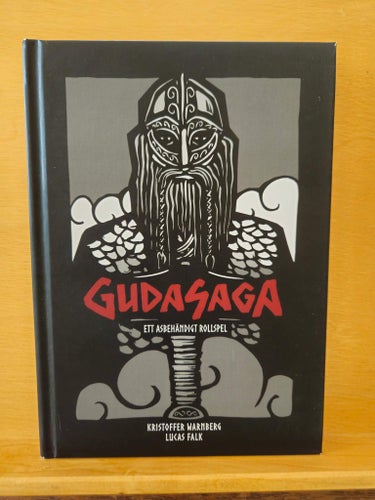 Gudasaga - ett asbehändigt rollspel, Warnberg & Falk