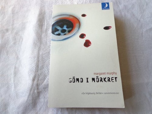 Gömd i mörkret av Margaret Murphy, 2003