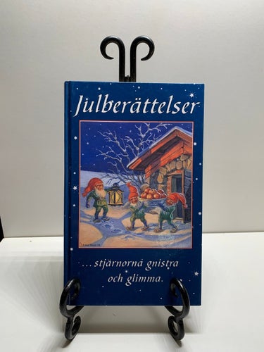 Boken: Julberättelser / stjärnorna gnistra och glimma .