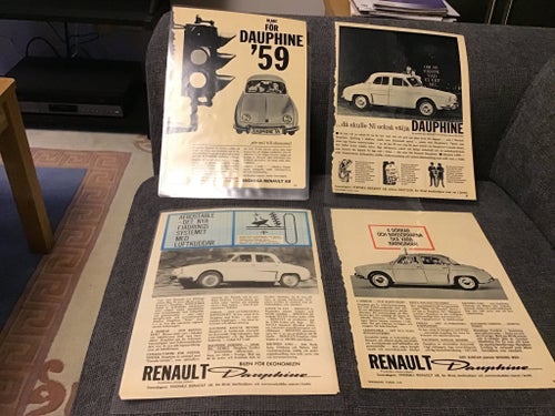 Sju laminerade originalannonser för Renault Dauphine.