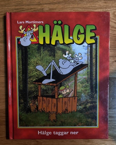 FOTOBOK. HÄLGE TAGGAR NER. - LARS MORTIMER.