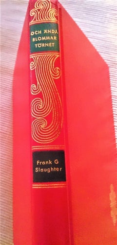 FRANK G SLAUGHTER. "OCH ÄNDÅ BLOMMAR TÖRNET". RÖTT HELFRANSKT LÄDERBAND
