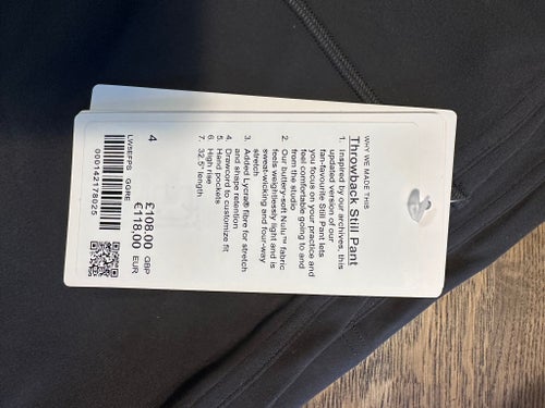 Lululemon mörkgrå byxor, storlek 4