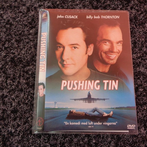 DVD-PUSHING TIN *John Cusack, Billy Bob Thornton*