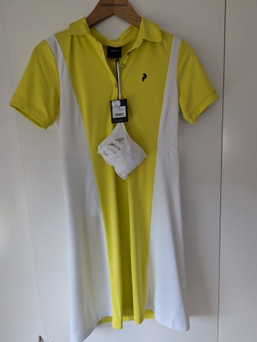 Ny Peak Performance klänning W Alta block dress i färgen citrine-white i st. S