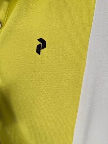Ny Peak Performance klänning W Alta block dress i färgen citrine-white i st. S