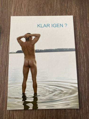 Postkort med mand i vand