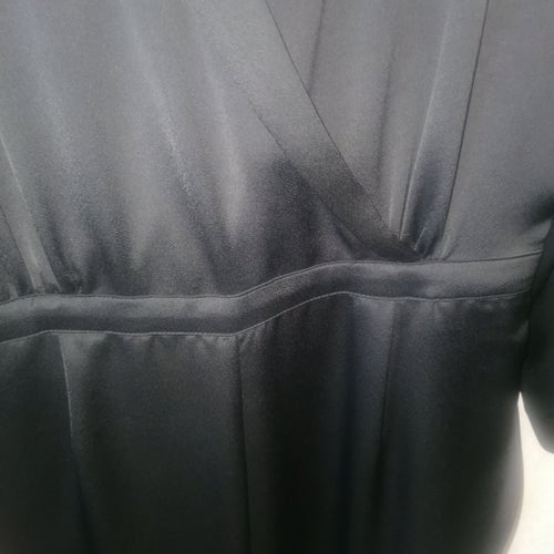 H&M svart jumpsuit, storlek 42