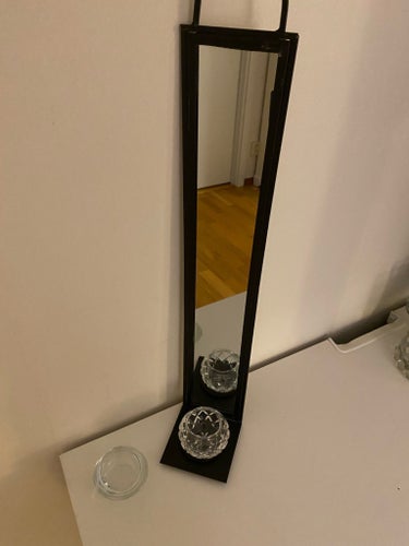 Väggspegel med hållare för värmeljus