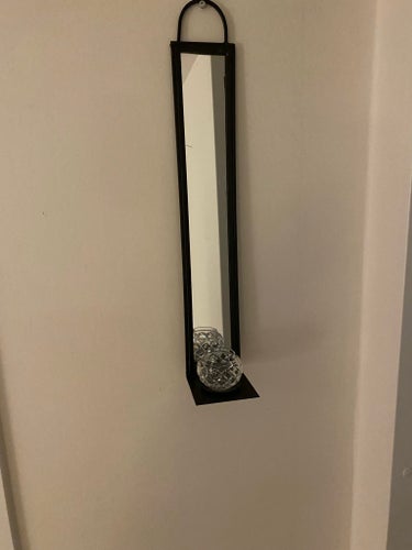 Väggspegel med hållare för värmeljus