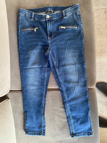 Nyskick KappAhl blåa ankel jeans , storlek 40