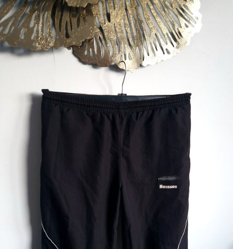 Salming Svarta Track Suit Pants S/M 160/170 träning fotboll överdragsbyxor byxor