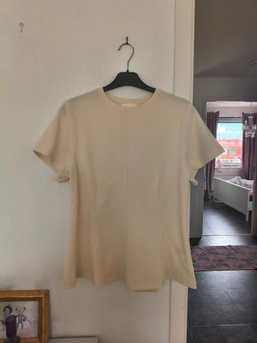 H&M ljusgul topp, peplum stil storlek L aldrig använd