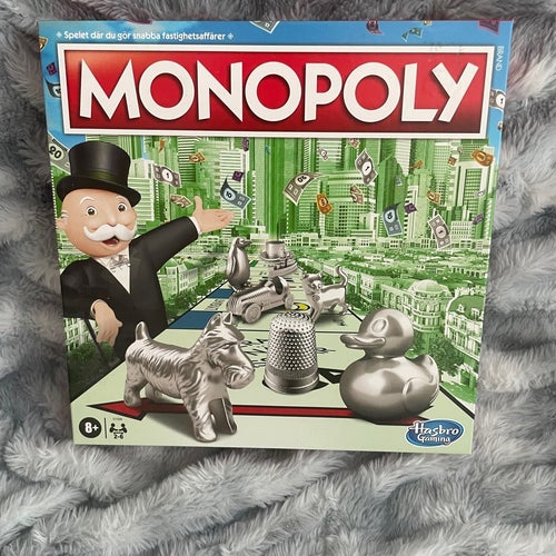 Oöppnat Monopoly Sällskapsspel