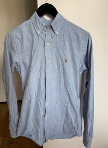 Ralph Lauren ljusblå skjorta, storlek XS