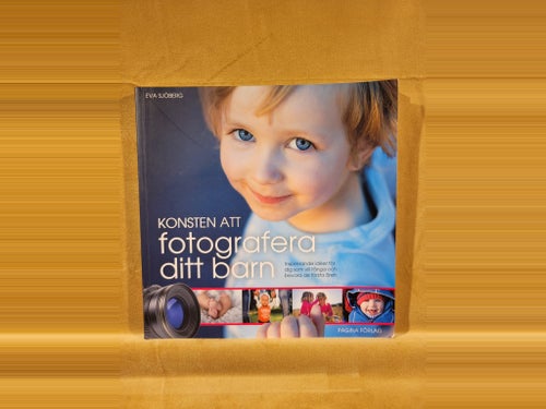 Konsten att fotografera ditt barn av Eva Sjöberg, 2014